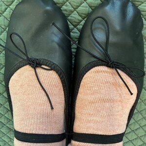 ABT black ballet slippers.